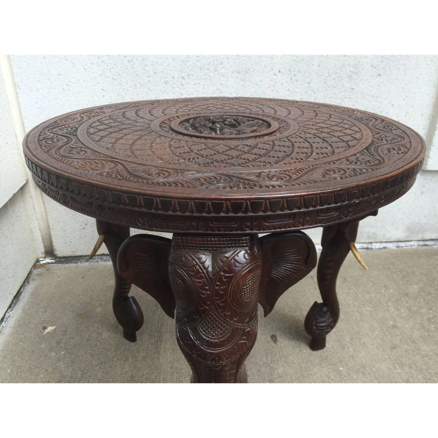 Elephant-Inspired Carved Nightstand: Exotic Elegance for Your Room